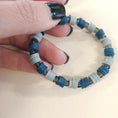 Load image into Gallery viewer, Gray and blue colored bracelet.