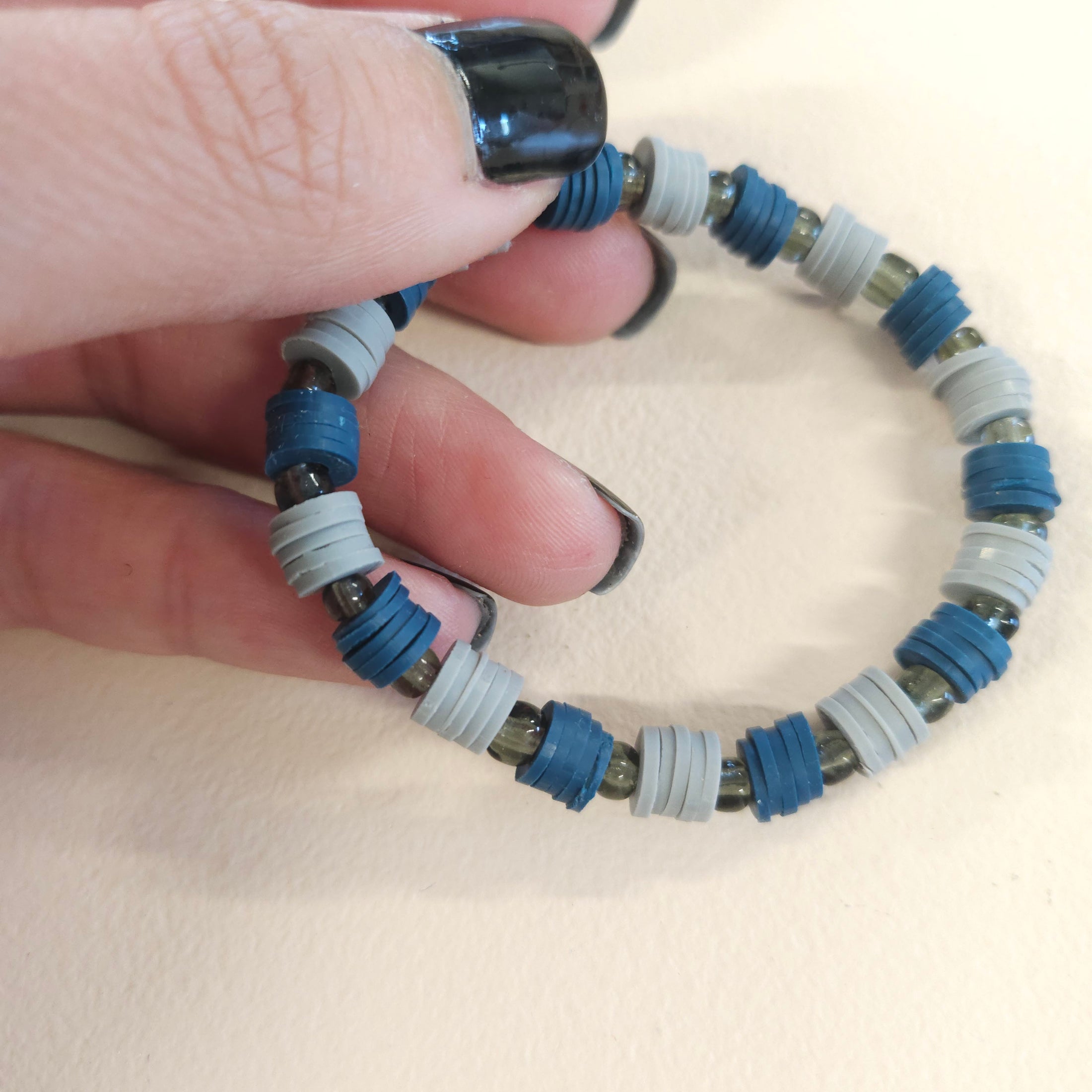 Gray and blue colored bracelet.