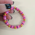 Load image into Gallery viewer, Funky themed bracelet.