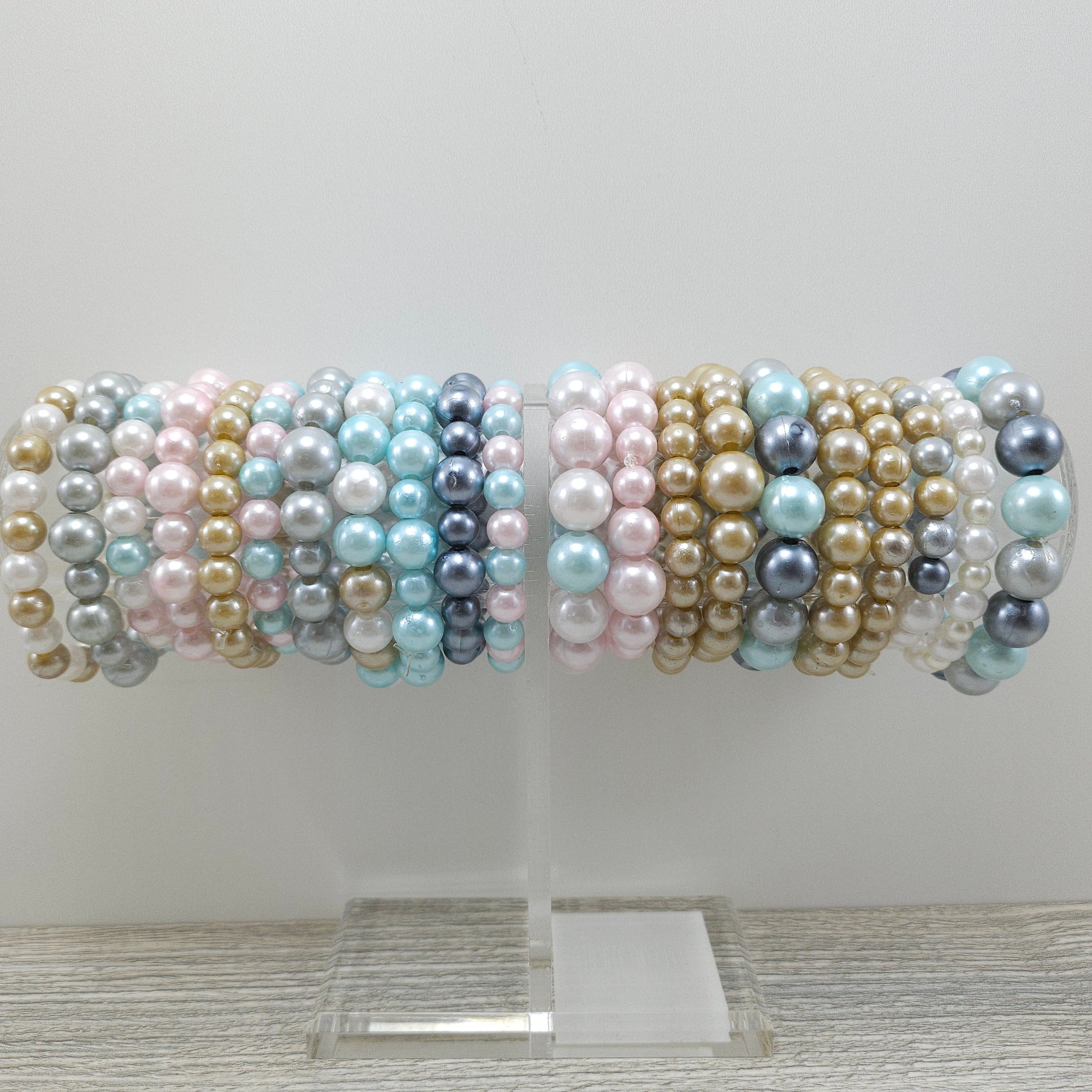 Faux pearl colorful fashion bracelets.