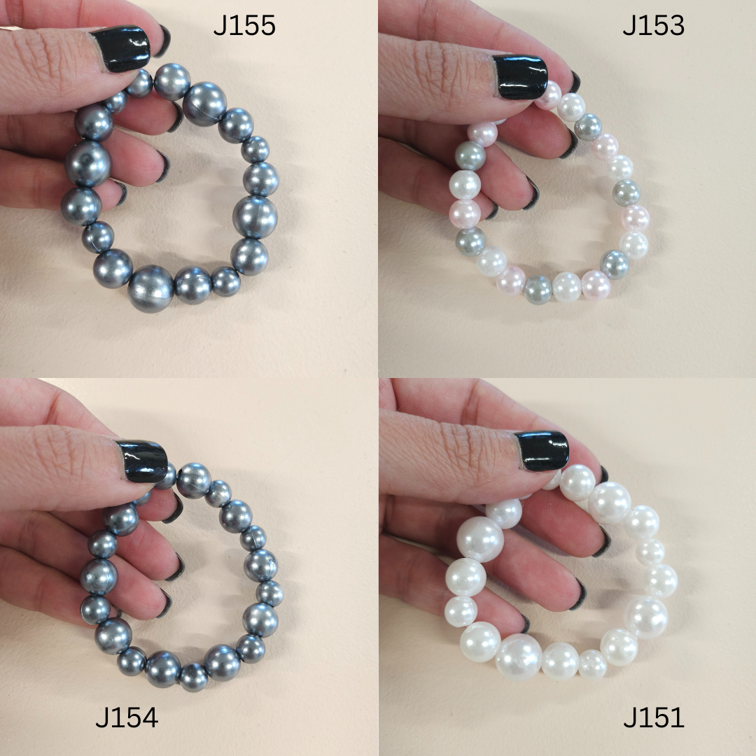Faux pearl stretch bracelets.