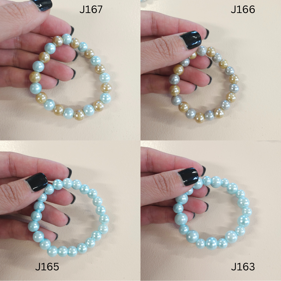 Faux pearl fashion bracelets in a variety of colors.