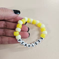 Load image into Gallery viewer, Fearless swiftie friendship bracelet.