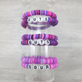 Load image into Gallery viewer, Livies friendship bracelet sets on rack.