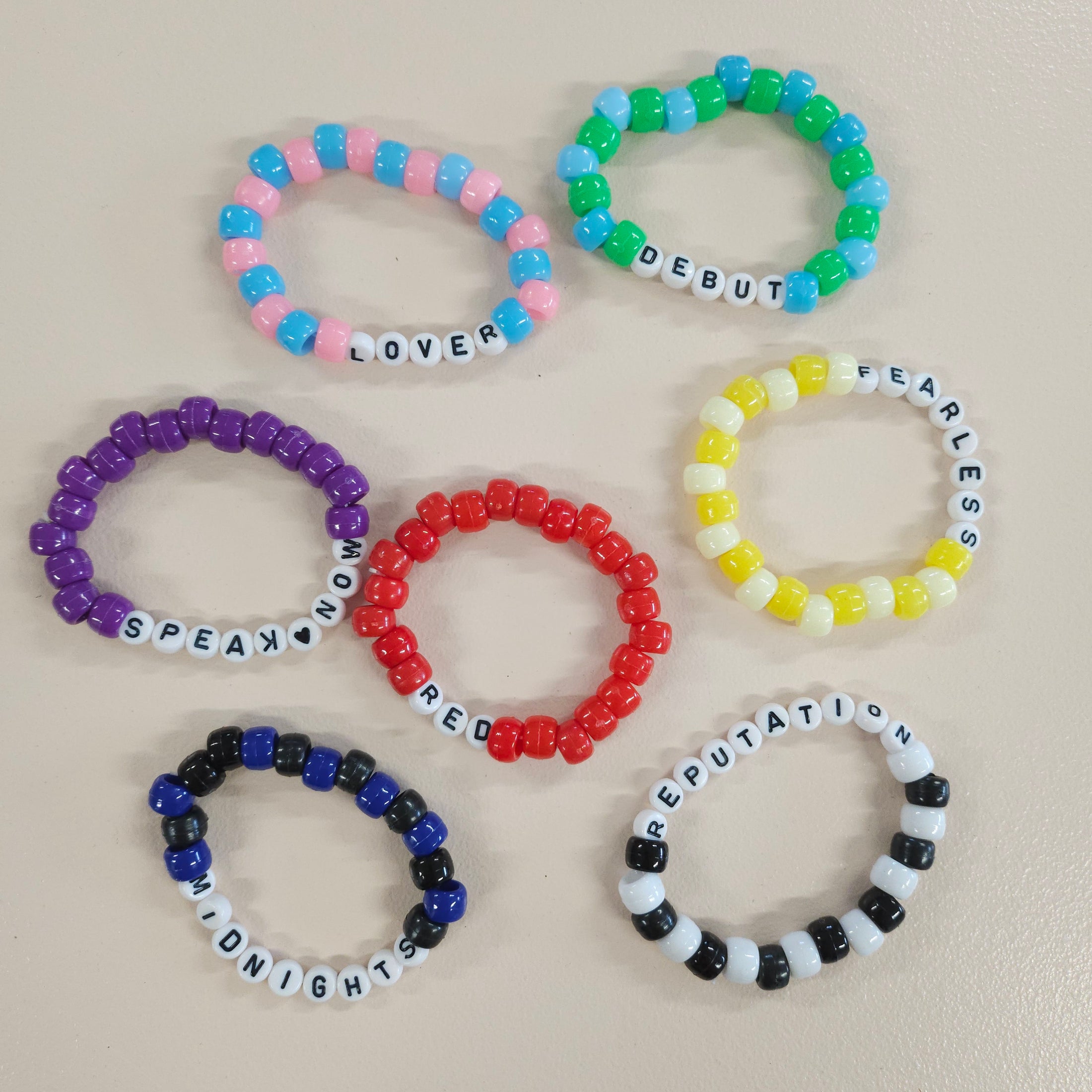 Swiftie stretch friendship bracelets.