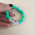 Load image into Gallery viewer, Debut swiftie friendship bracelet.