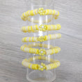 Load image into Gallery viewer, Yellow flower stretch friendship bracelet.