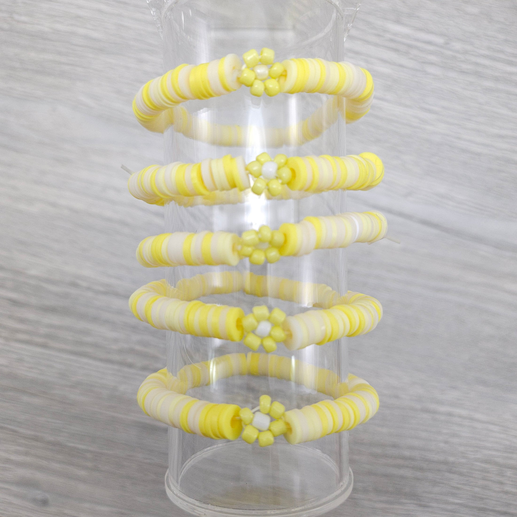 Yellow flower stretch friendship bracelet.