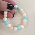 Load image into Gallery viewer, Pastel cream, green and pink stretch bracelet.