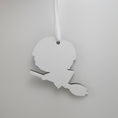 Load image into Gallery viewer, Black and white half blood wizard on a broomstick ornament.