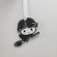 Load image into Gallery viewer, Pure blood wizarding world wizard riding on a broomstick black and white ornament.