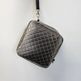 Load image into Gallery viewer, Quilted gray handbag on a light gray background