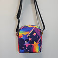 Load image into Gallery viewer, Colorful bag with star and rainbow pattern on a light gray background