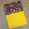 Load image into Gallery viewer, Two fabric swatches, one with a colorful mushroom pattern and the other with a yellow polka dot pattern, on a textured surface.