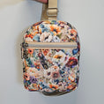Load image into Gallery viewer, Floral patterned fanny pack on a light gray background