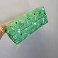 Load image into Gallery viewer, Bottom of the green school supplies zipper bag.
