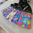 Load image into Gallery viewer, Colorful quilt with cartoon character on a cutting mat