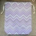 Load image into Gallery viewer, Purple chevron drawstring bag with white strings.