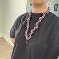 Load image into Gallery viewer, Person wearing a black shirt and a purple skinny scrunchie lanyard.