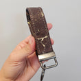 Load image into Gallery viewer, Brown and gold cork keychain.