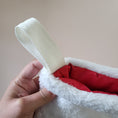 Load image into Gallery viewer, Hanging strap of the quilted buddy the elf holiday stocking.