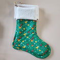 Load image into Gallery viewer, Quilted disney holiday stockings in 2 sizes.