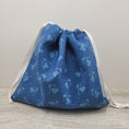 Load image into Gallery viewer, Dark blue drawstring bag with cross stitch heart and needle design.