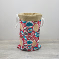 Load image into Gallery viewer, Mr. Potato Head drawstring bag with light brown interior and white ribbon.