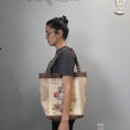 Load image into Gallery viewer, Vintage flower seed shoulder tote bag worn on the shoulder.