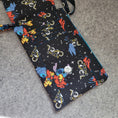 Load image into Gallery viewer, Beyond cool stitch in space cell phone purse with hidden card slots.
