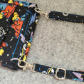 Load image into Gallery viewer, Beyond cool stitch in space cell phone purse with adjustable and removable strap.