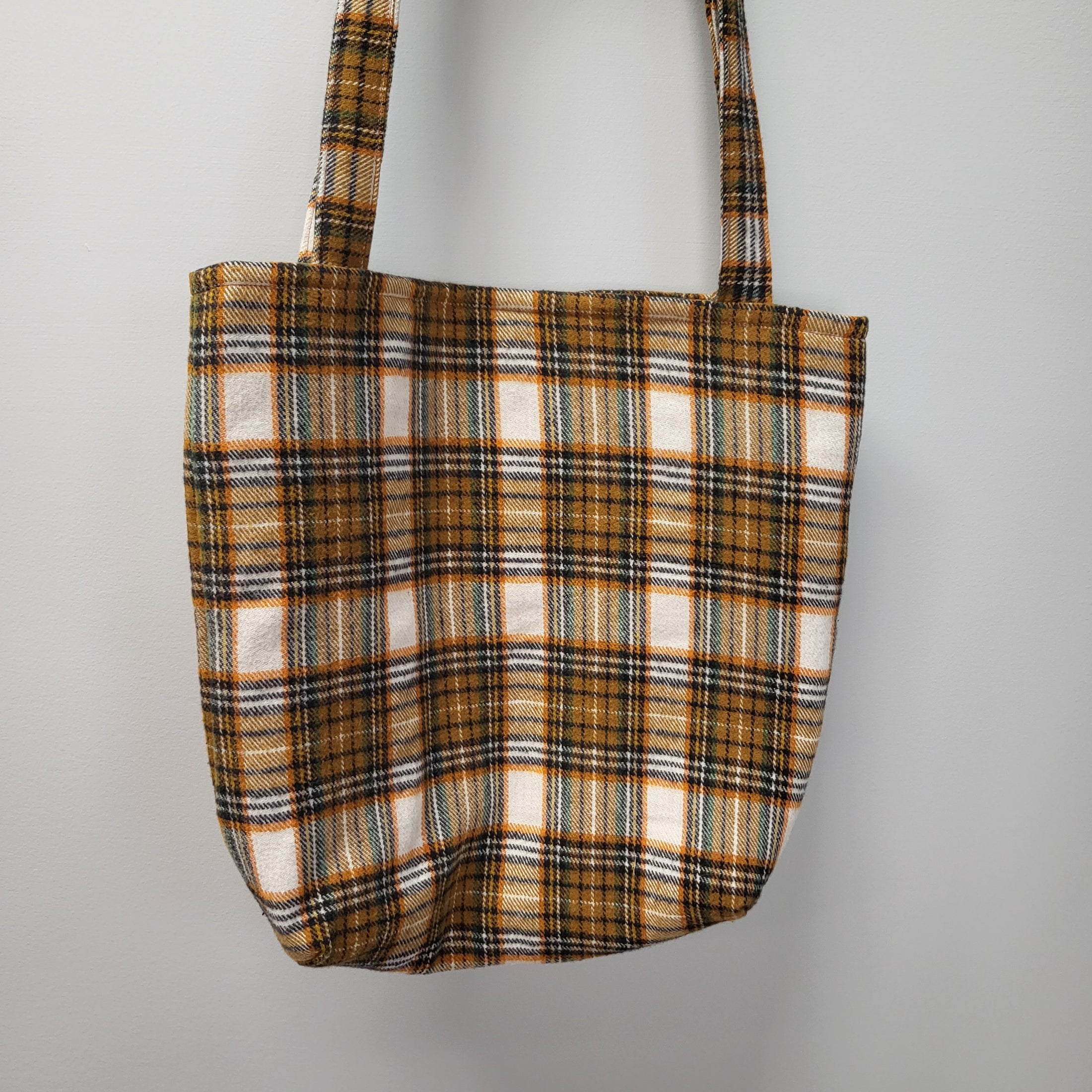 Orange, black and green soft plaid flannel tote bag.