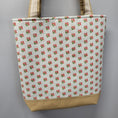 Load image into Gallery viewer, Back of the bluebirds tote bag with small pink and green flowers.