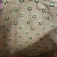 Load image into Gallery viewer, Close up view of the brown interior with green flowers in the bluebird tote bag.
