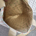 Load image into Gallery viewer, Light brown with green flowers interior of the bluebirds tote bag.