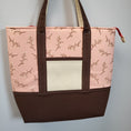 Load image into Gallery viewer, Padded cherry blossom tote bag with zippered main compartment and 2 exterior slip pockets.