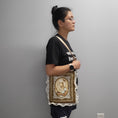 Load image into Gallery viewer, Person wearing the lady gardener bag on shoulder.