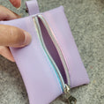 Load image into Gallery viewer, Light purple mini zipper pouch with rainbow zipper tape included with the Mario Kart inspired bag.