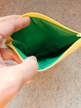 Load image into Gallery viewer, Green interior of the watercolor lace zipper pouch.