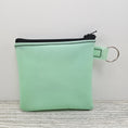 Load image into Gallery viewer, Mint green jelly vinyl zipper pouch with key ring.