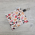 Load image into Gallery viewer, Mini disney treats zipper pouch for carrying cards and cash.
