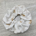 Load image into Gallery viewer, Gold bows scrunchie.