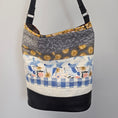 Load image into Gallery viewer, Hobo over the shoulder bag with patterned fabric on a gray background