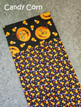 Load image into Gallery viewer, Candy corn halloween pillowcase for trick-or-treating.