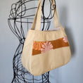 Load image into Gallery viewer, Exterior pockets of let the sunshine in tote bag.