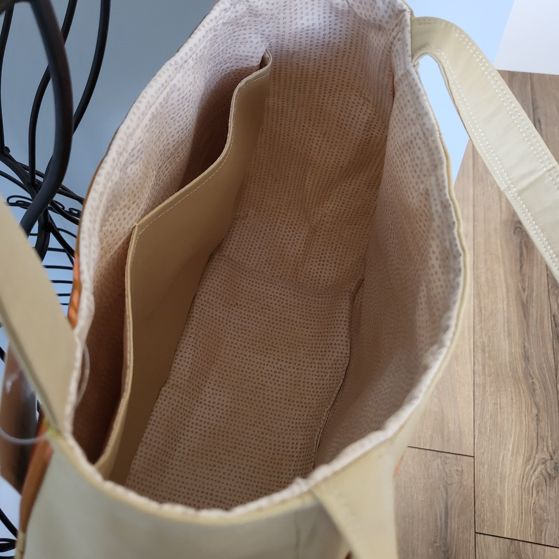 Interior of let the sunshine in shoulder bag.