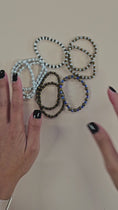 Load and play video in Gallery viewer, Video of the metallic stretch bracelets.