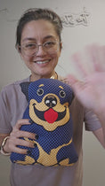 Load and play video in Gallery viewer, Video of the Rottweiler snuggle pillow plush.