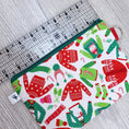 Load image into Gallery viewer, Small Zipper Pouch Ugly Christmas Sweaters-The Steady Hand