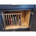 Load image into Gallery viewer, Deluxe muffin pan vertical in kitchen cabinet.